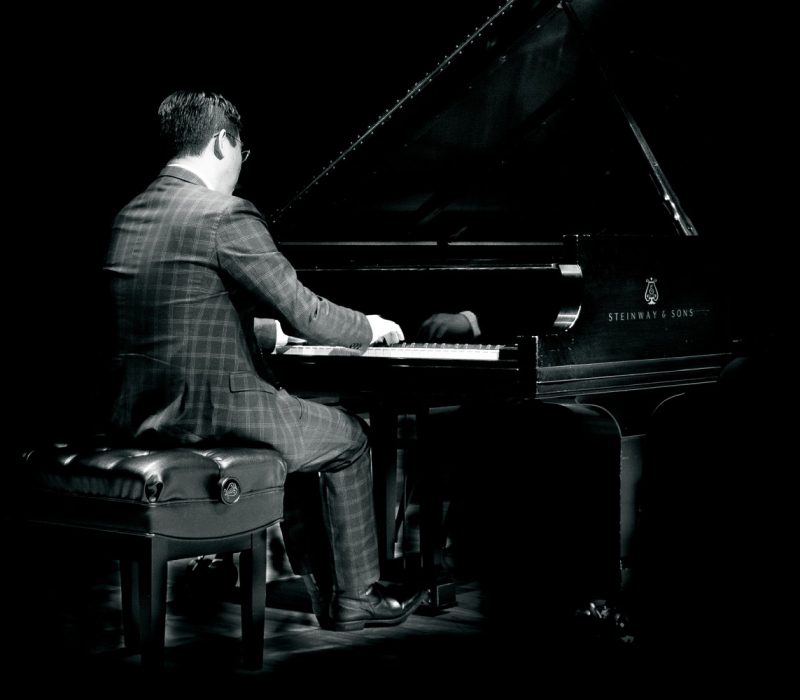 Chih-Long Hu playing piano