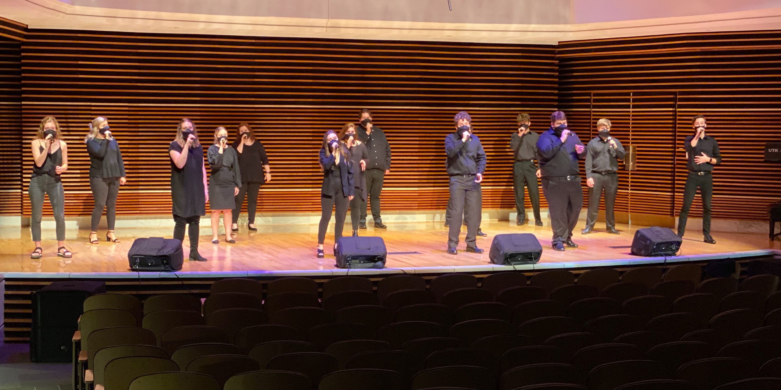 The UT Singers perform in the Sandra G. Powell Recital Hall while wearing masks and being proprerly socially distanced.